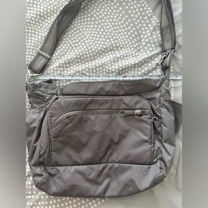 Theft proof crossbody bag. Used for one trip.